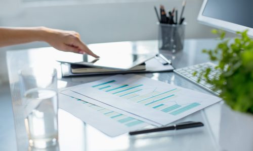 The female hands using laptop while working on computer at modern office interior, businesswoman concept